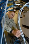 Staff Sgt. Armando Largaespada, an avionics logistics manager assigned to the 28th Maintenance Squadron, works on the new Advanced Radar Electronic Warfare Test Station (ARTS) at Ellsworth Air Force Base, S.D., Dec. 9, 2016. The ARTS allow maintainers to be more agile and flexible in the workshop, using less power, generating less heat and is less than half the size of the older Radar Electronic Warfare stations. (U.S. Air Force photo by Airman 1st Class Donald C. Knechtel)