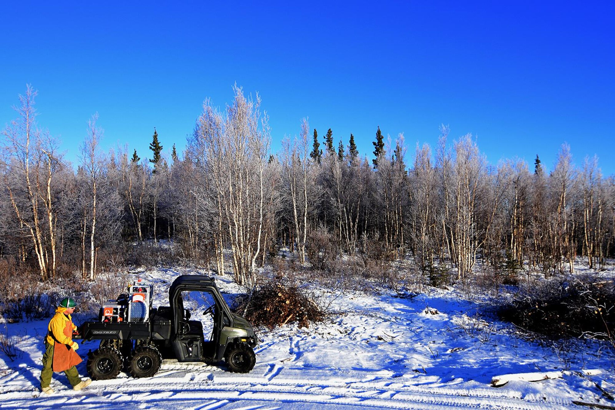 Bureau of Land Management Alaska Fire Service specialist Bob Schober prepares the Terra Torch for work as part of a prescribed burn project in U.S. Army Alaska’s Donnelly Training Area near Fort Greely Nov. 4, 2016. AFS provides wildland fire management for 1.6 million acres of military withdrawn public land under an interagency service agreement with U.S. Army Alaska. (Army photo/John Pennell)