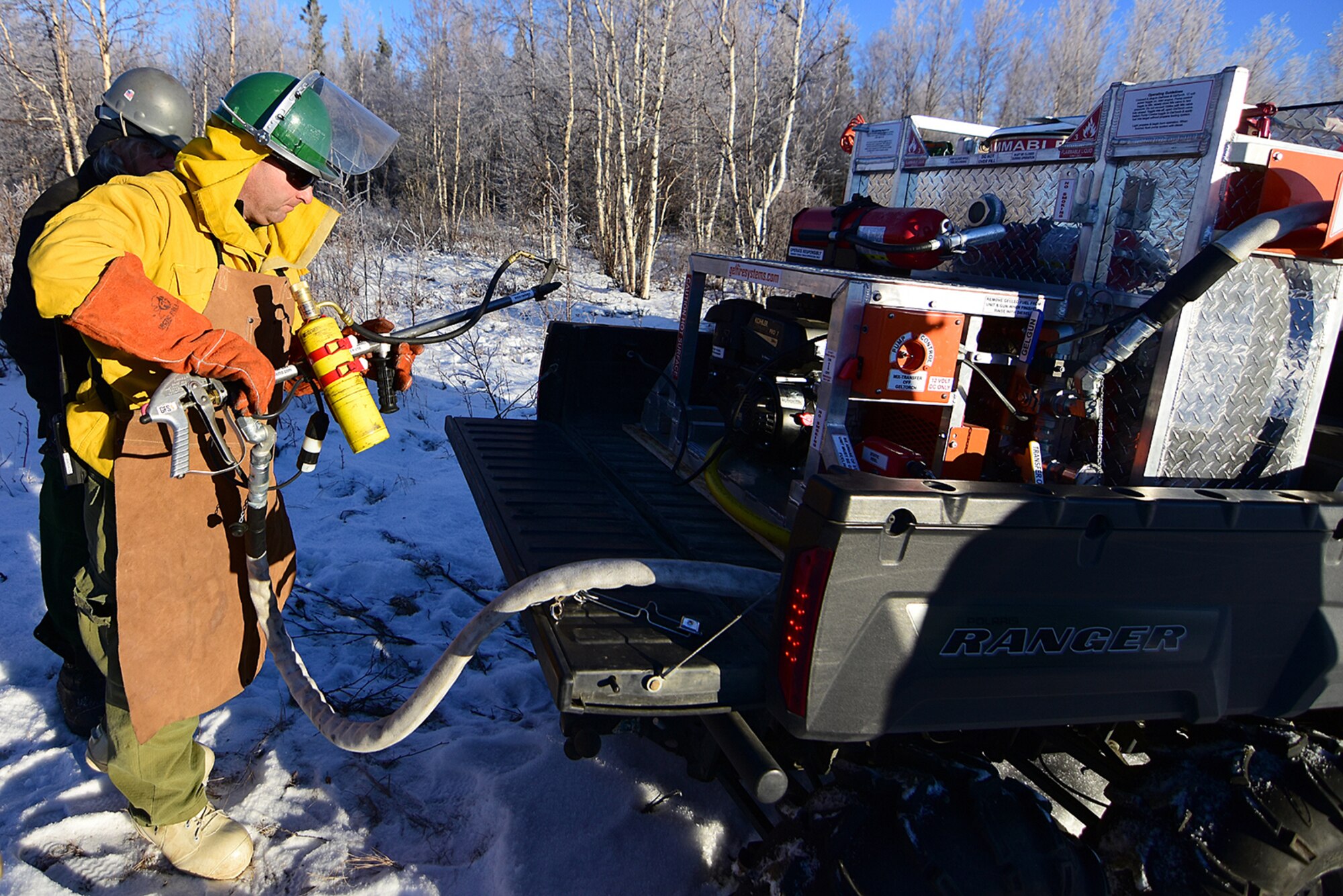 Bureau of Land Management Alaska Fire Service specialist Bob Schober prepares the Terra Torch for work as part of a prescribed burn project in U.S. Army Alaska’s Donnelly Training Area near Fort Greely Nov. 4, 2016. AFS provides wildland fire management for 1.6 million acres of military withdrawn public land under an interagency service agreement with U.S. Army Alaska. (Army photo/John Pennell)