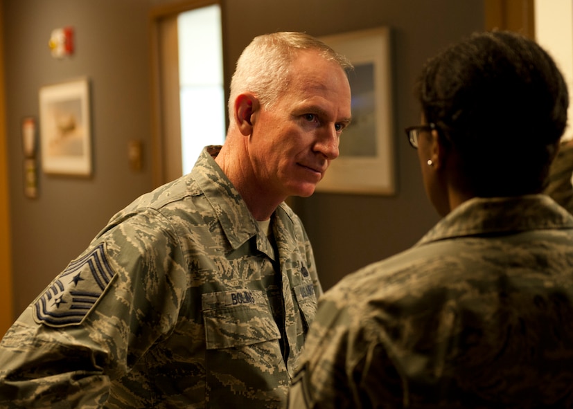 Chief Master Sgt. Alan Boling, 8th Air Force command chief, speaks with Senior Master Sgt. Odette Toppin, 5th Operations Group superintendent at Minot Air Force Base, N.D., Dec. 15, 2016. Boling toured Minot’s facilities, including the air traffic control tower and spoke with 5th Bomb Wing Airmen. (U.S. Air Force photo/Airman 1st Class J.T. Armstrong)