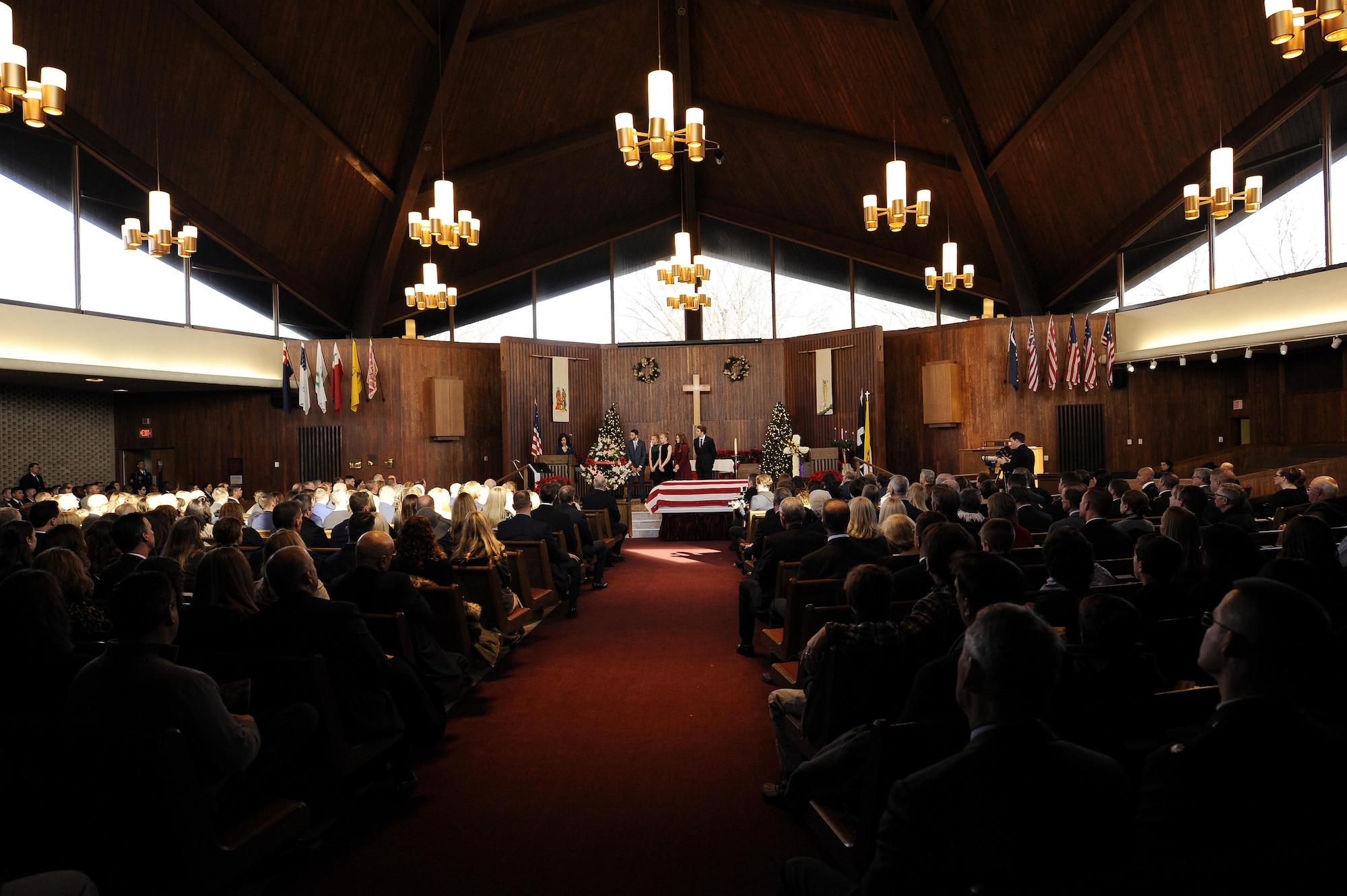 The family of  Maj. Troy Gilbert speaks during his memorial service at Joint Base Meyer-Henderson Hall, Va., Dec. 19, 2016. Gilbert was killed Nov. 27, 2006, while flying a mission in direct support of coalition ground combat operations when his F-16C Fighting Falcon crashed approximately 20 miles northwest of Baghdad. (U.S. Air Force photo/Staff Sgt. Jannelle McRae) 