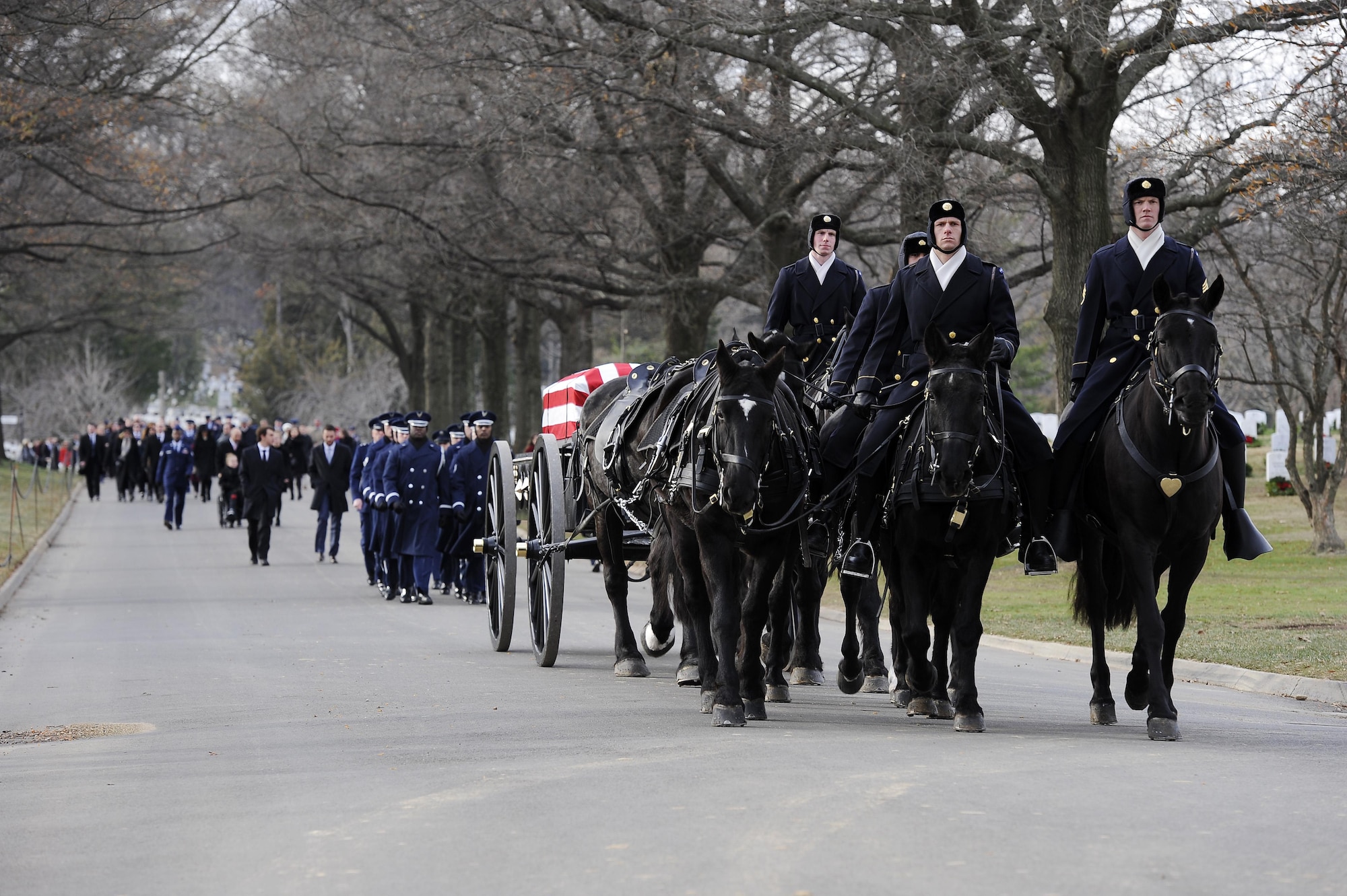 Maj. Troy Gilbert is carried by caisson during his final interment at Arlington National Cemetery, Va., Dec. 19, 2016. Gilbert was killed Nov. 27, 2006, while flying a mission in direct support of coalition ground combat operations when his F-16C Fighting Falcon crashed approximately 20 miles northwest of Baghdad. This was the third interment for the Airman at Arlington since 2006, and reunited remains recovered this year with partial remains originally recovered in 2006 and 2012. (U.S. Air Force photo/Staff Sgt. Jannelle McRae)