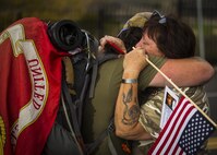 Jon Hancock, a Marine veteran, hugs a fallen friend’s mother after entering Camp Pendleton, Dec. 11, 2016. Hancock walked across the country from Maryland to California honoring his fallen brothers and raising awareness for veterans. Marines with 2nd Battalion, 4th Marine Regiment stood on the road from the base gate to the parade deck where the ceremony was held finalizing Hancock’s long trip.  (U.S. Marine Corps photo by Lance Cpl. Frank Cordoba)