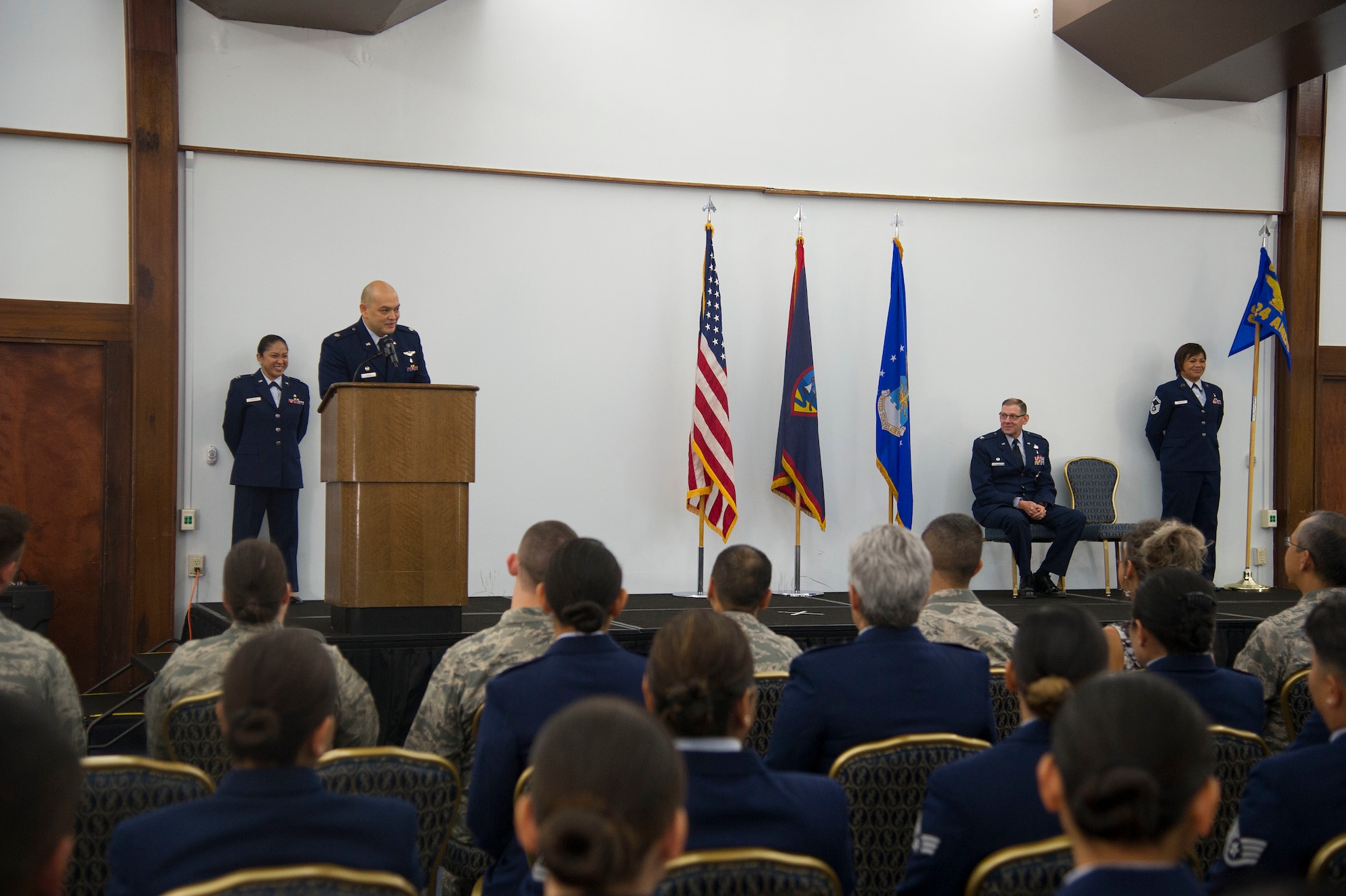 U.S. Air Force Lt. Col. John Tudela, the new 624th Aerospace Medicine Flight commander, addresses the audience during an assumption of command ceremony Dec. 11, 2016 at the Sunrise Conference Center, Andersen Air Force Base, Guam. The 624th AMDF supports the 624th Regional Support Group’s mission to deliver mission essential capability through combat readiness, quality management and peacetime deployments in the Pacific area of responsibility. (U.S. Air Force photo by Master Sgt. Theanne Herrmann)