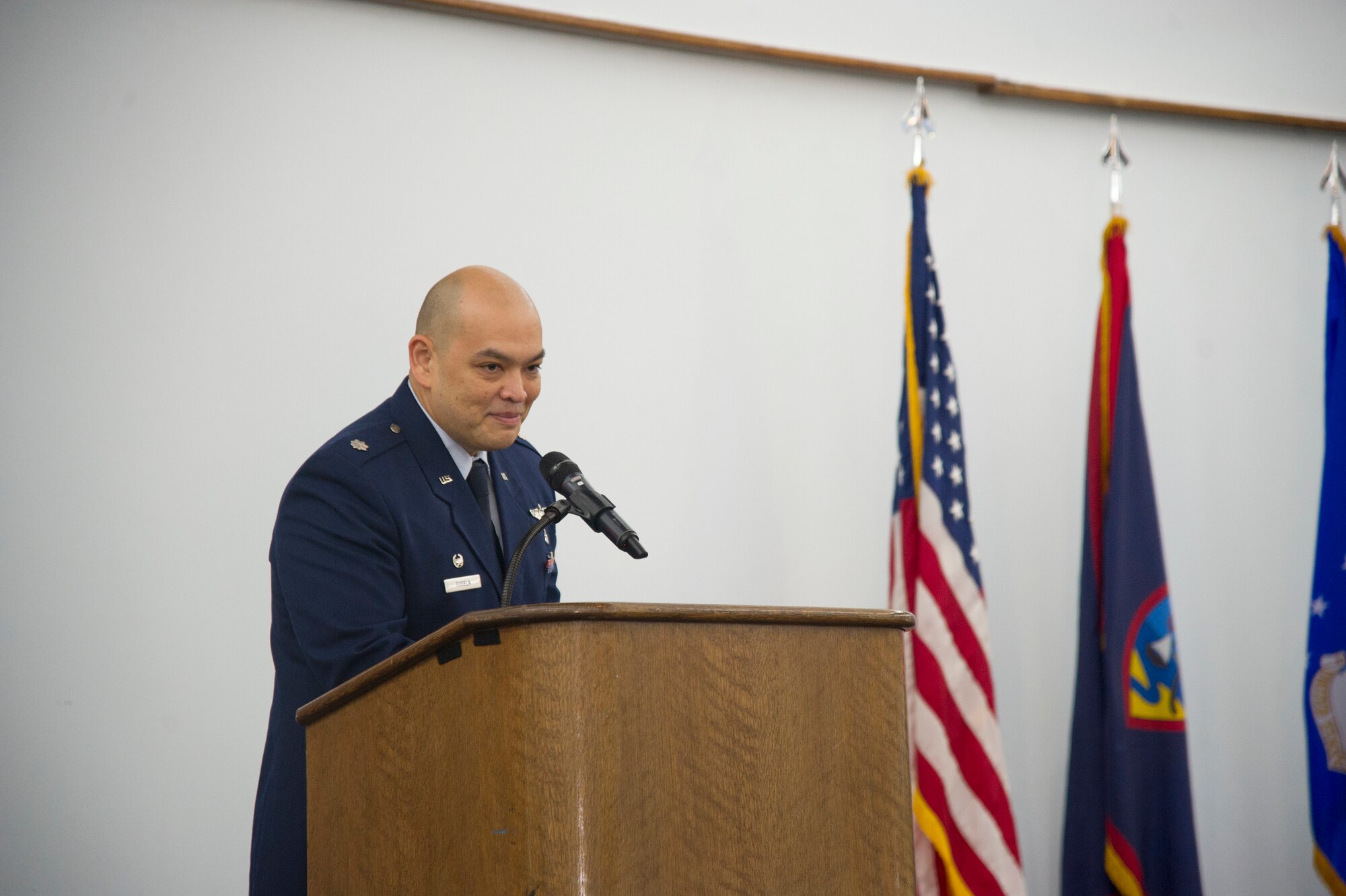 U.S. Air Force Lt. Col. John Tudela, the new 624th Aerospace Medicine Flight commander, addresses the audience during an assumption of command ceremony Dec. 11, 2016 at the Sunrise Conference Center, Andersen Air Force Base, Guam. The 624th AMDF supports the 624th Regional Support Group’s mission to deliver mission essential capability through combat readiness, quality management and peacetime deployments in the Pacific area of responsibility. (U.S. Air Force photo by Master Sgt. Theanne Herrmann)