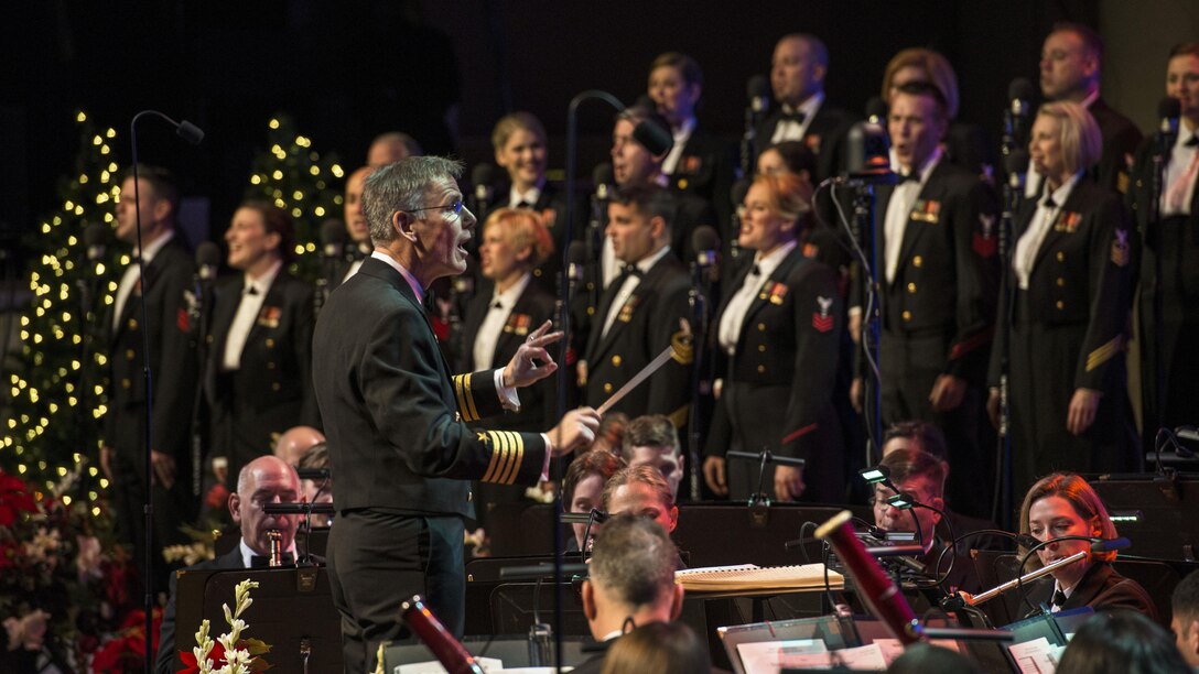 <strong>Photo of the Day: Dec. 20, 2016</strong><br/><br />Navy Capt. Kenneth Collins conducts the U.S. Navy Band during a holiday concert at DAR Constitution Hall in Washington, D.C., Dec. 17, 2016. The Navy Band hosted thousands of people from the Washington area as well as hundreds of senior Navy and government officials during its three annual holiday concerts. Navy photo by Chief Petty Officer Adam Grimm<br/><br /><a href="http://www.defense.gov/Media/Photo-Gallery?igcategory=Photo%20of%20the%20Day"> Click here to see more Photos of the Day. </a> 