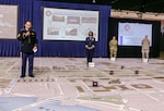 U.S. Army Master Sgt. Aaron Lovely, senior enlisted planner, Joint Task Force-National Capital Region, introduces the subject matter experts involved in inaugural planning and execution during the ceremonial rehearsal of concept drill at the D.C. National Guard Armory in Washington, D.C., Dec. 14, 2016. This final planning symposium showcased the culmination of months of preparation between military and civilian entities for the 58th presidential inauguration.