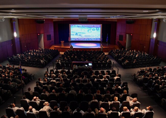 Members of Team Charleston attend an All Call hosted by Maj. Gen. Christopher J. Bence, U.S. Air Force Expeditionary Center commander, and Command Chief Master Sgt. Larry C. Williams, U.S. Air Force Expeditionary Center command chief, at the Base Theater, Dec. 15, 2016. While at Joint Base Charleston, Bence toured Team Charleston's facilities to get a first-hand look at joint operations. 