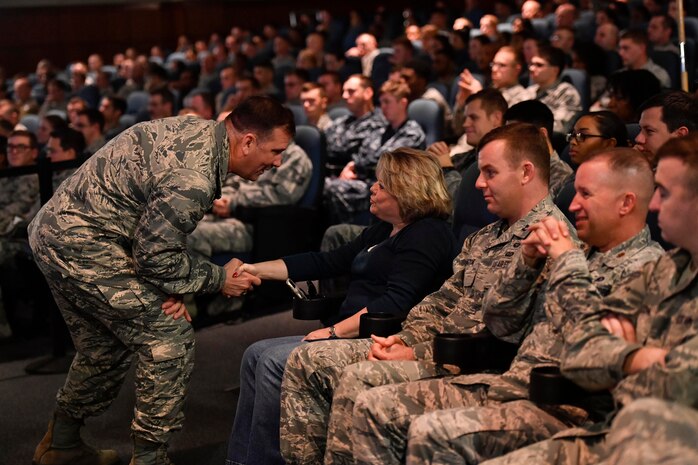 Maj. Gen. Christopher J. Bence, U.S. Air Force Expeditionary Center commander, greets members of Team Charleston during an All Call at the Base Theater here, Dec. 15, 2016. While at Joint Base Charleston, Bence toured Team Charleston's facilities to get a first-hand look at joint operations.