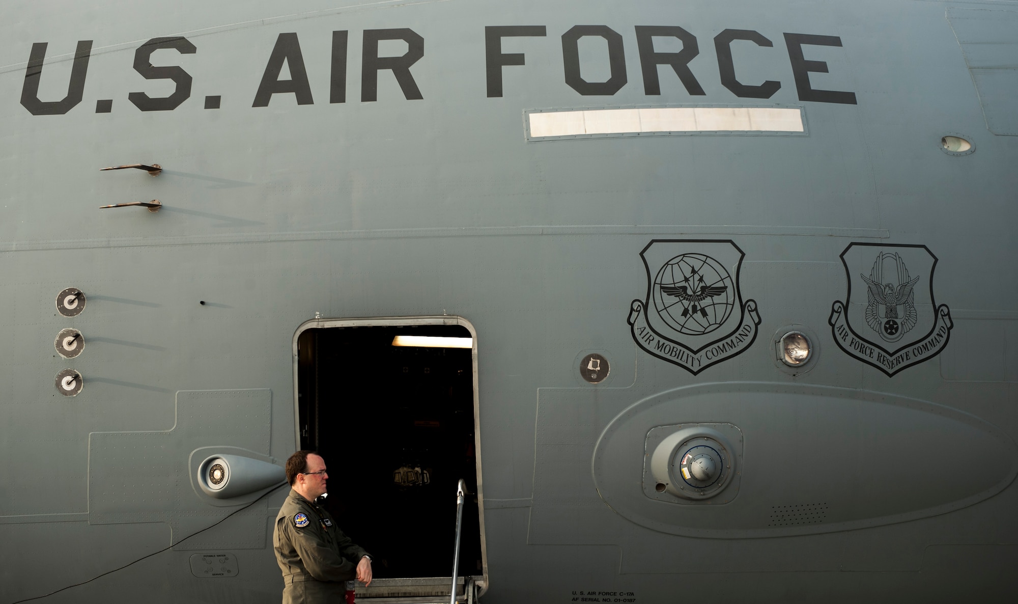 Tech. Sgt. Mike Smith, loadmaster, stands by a C-17 Globemaster III prior to joint forcible entry exercise on Nellis Air Force Base, Nev., Dec. 10, 2016. JFEX is meant to challenge aircrews and ground combat units involved, and is an evaluation of the mission leadership's ability to efficiently integrate ground forces and dissimilar aircraft into one "strike package." (U.S. Air Force photo by Airman 1st Class Kevin Tanenbaum)