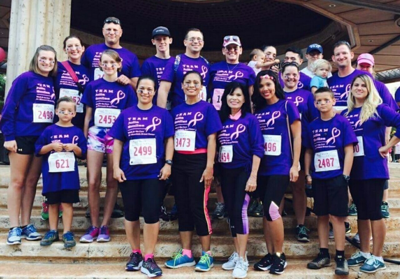 Army Staff Sgt. Brian Hughes and his wife, Julia, top center, take part in a Komen Hawaii Race for the Cure at Honolulu, Hawaii, on Oct. 16, 2016. Members of the 2nd Battalion, 35th Infantry Regiment participated in the race in support of Julia, who is a breast cancer survivor. Courtesy photo
