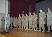 Brig. Gen. Andrea Tullos, director of Security Forces, recognizes Team Minot defenders during an all-call at Minot Air Force Base, N.D., Dec. 20, 2016. These Airmen were acknowledged for going above and beyond in their daily duties and during exercises. (U.S. Air Force photo/Senior Airman Apryl Hall)