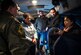 Retired Col. Regina Aune, right, describes to Col. Thomas K. Smith, 433rd Airlift Wing commander, Dec. 19, 2016, how the children were bedded down in the overhead troop compartment of the aircraft, during “Operation Babylift.” Aune was on the first military aircraft to Vietnam to bring the refugees to the United States. “Operation Babylift” was a combined effort between the United States, Canada, Australia and France, to evacuate more than 3,300 refugees from South Vietnam. (U.S. Air Force photo by Minnie Jones)     
