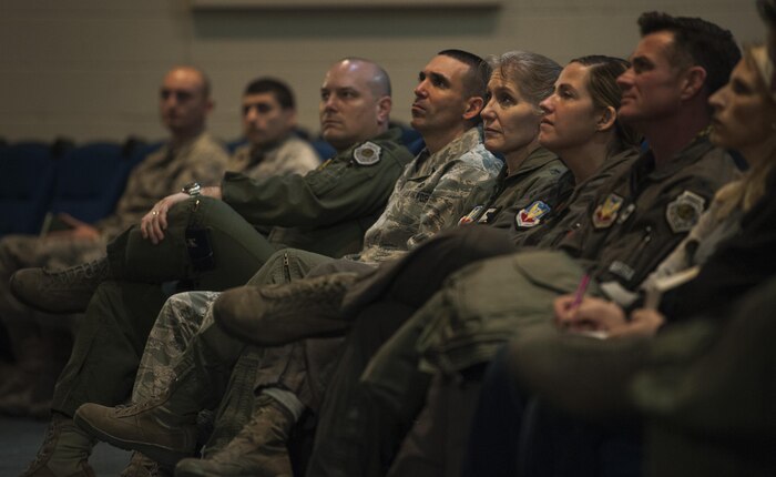 Members of 57th Wing leadership listen to Simon Sinek as he gives a presentation in the Base Theater of Nellis Air Force Base, Dec. 9, 2016. Sinek's first TEDx Talk on "How Great Leaders Inspire Action" is the 3rd most viewed video on TED.com. (U.S. Air Force Base by Airman 1st Class Kevin Tanenbaum/Released)