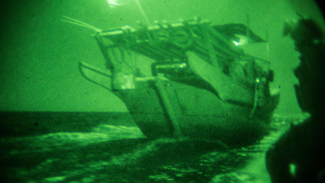GULF OF ADEN (Dec. 12, 2016) U.S. Marines with the Maritime Raid Force, 11th Marine Expeditionary Unit (MEU), approach an unknown vessel from its stern to conduct a visit, board, search and seizure mission as part of Exercise Alligator Dagger, Dec. 12. Maritime security operations complement counterterrorism and security efforts of regional nations and seek to disrupt violent extremists’ use of the maritime environment as a venue to launch attacks or to transport personnel, weapons or other material. Exercise Alligator Dagger, a U.S. 5th Fleet exercise, is a sustainment exercise enabling Makin Island Amphibious Ready Group and 11th MEU to rehearse complex amphibious operations that keep their skills ready for crisis response and contingency operations throughout the Central Command area of responsibility. (U.S. Marine Corps photo by Gunnery Sgt. Robert B. Brown Jr.)