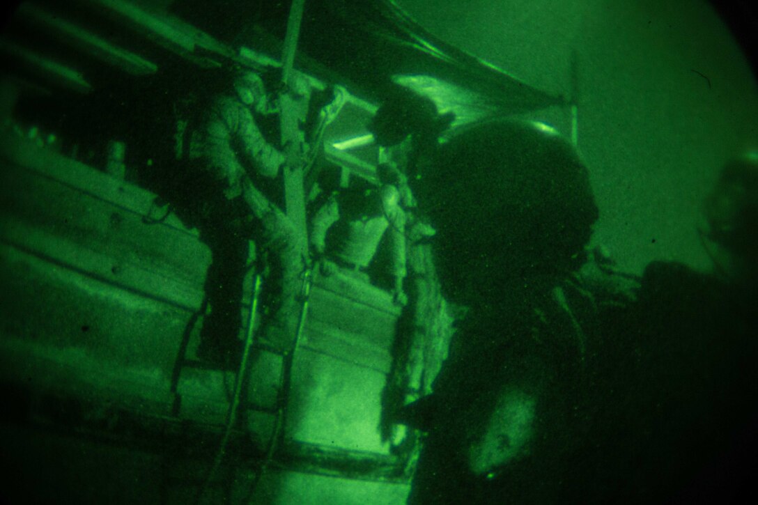 GULF OF ADEN (Dec. 12, 2016) U.S. Marines with the Maritime Raid Force, 11th Marine Expeditionary Unit (MEU), approach an unknown vessel from its stern to conduct a visit, board, search and seizure mission as part of Exercise Alligator Dagger, Dec. 12. Maritime security operations complement counterterrorism and security efforts of regional nations and seek to disrupt violent extremists’ use of the maritime environment as a venue to launch attacks or to transport personnel, weapons or other material. Exercise Alligator Dagger, a U.S. 5th Fleet exercise, is a sustainment exercise enabling Makin Island Amphibious Ready Group and 11th MEU to rehearse complex amphibious operations that keep their skills ready for crisis response and contingency operations throughout the Central Command area of responsibility. (U.S. Marine Corps photo by Gunnery Sgt. Robert B. Brown Jr.)