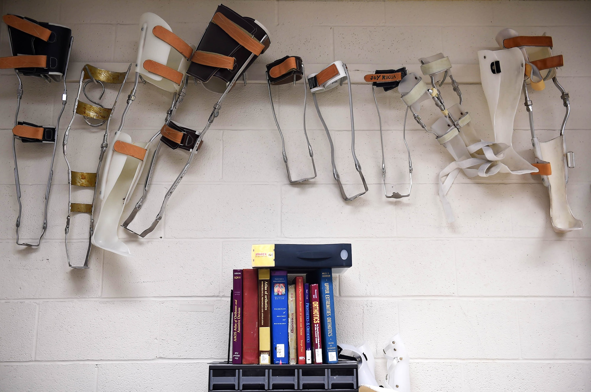 Leg braces created by former orthotics training students are displayed in the brace shop at the Wilford Hall Ambulatory Surgical Center, Joint Base San Antonio-Lackland, Texas, Aug. 24, 2016.(U.S. Air Force photo/Staff Sgt. Jerilyn Quintanilla)