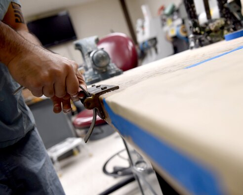 Staff Sgt. Kenneth Rivera, a student in the orthotics program, bends metal for a leg brace at the Wilford Hall Ambulatory Surgical Center, Joint Base San Antonio-Lackland, Texas, Oct. 19, 2016.(U.S. Air Force photo/Staff Sgt. Jerilyn Quintanilla)