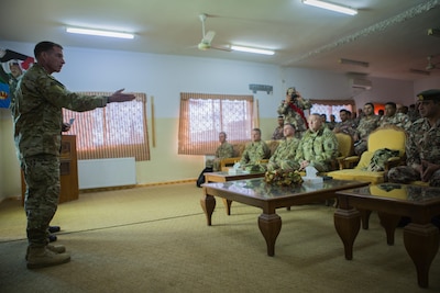 AMMAN (December 15, 2016) -- U.S. Army Command Sgt. Maj. Bill Thetford delivers remarks during a graduation ceremony for the Jordan Basic Instructor Course. The two-week long course, which features instruction from U.S. Army Non-Commissioned Officers, is designed to enhance the leadership abilities of the JAF’s enlisted leaders. (U.S. Central Command photo by Marine Sgt. Jordan Belser)