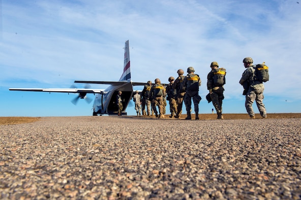 Airmen from Moody’s 820th Base Defense Group board a U.S. Army CASA C-212 with U.S. Air Force and Army counterparts as well as German Army jumpmasters during the 19th Annual Randy Oler Memorial Operation Toy Drop, Dec. 15, 2016, at Mackall Army Air Field, N.C. The 820th BDG trained with domestic, German, Italian, and Canadian jumpmasters to share and learn airborne training tactics, and expand their experience through working with partner nations. (U.S. Air Force photo by Airman 1st Class Greg Nash)   