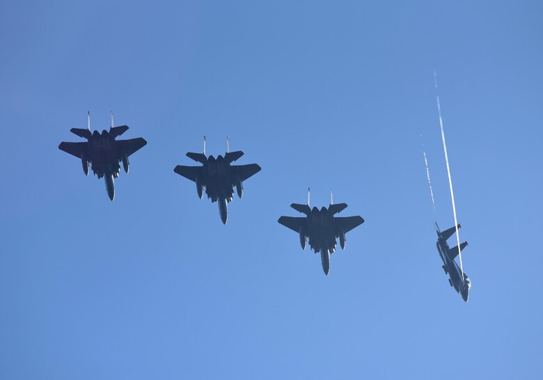 Four U.S. Air Force F-15E Strike Eagles from Mountain Home Air Force Base, Idaho, fly overhead during Checkered Flag 17-1 at Tyndall Air Force Base, Fla., Dec. 16, 2016. Air Force aviators from across the country converged at Tyndall for Checkered Flag 17-1, a large-scale aerial total-force exercise, to participate in high-end multi-airframe integration training from Dec. 5-16. (U.S. Air Force photo by Staff Sergeant Alex Fox Echols III/Released)