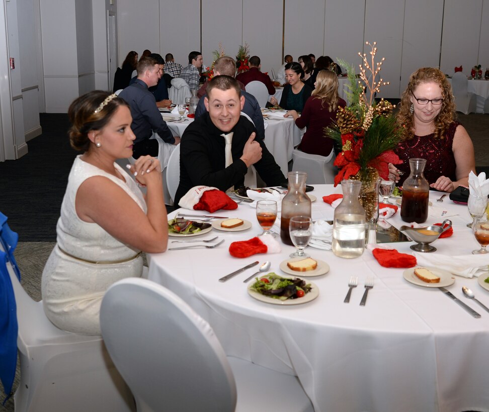 Active-duty Sailors and civilian personnel at Naval Branch Health Clinic-Albany, aboard Marine Corps Logistics Base Albany, kick off the holiday season at the Hilton Garden Inn, Albany, Ga., Dec. 15. Clinic personnel and guests participated in door-prize drawings as well as “White Elephant” gift exchanges and was served a plated-banquet feast.
