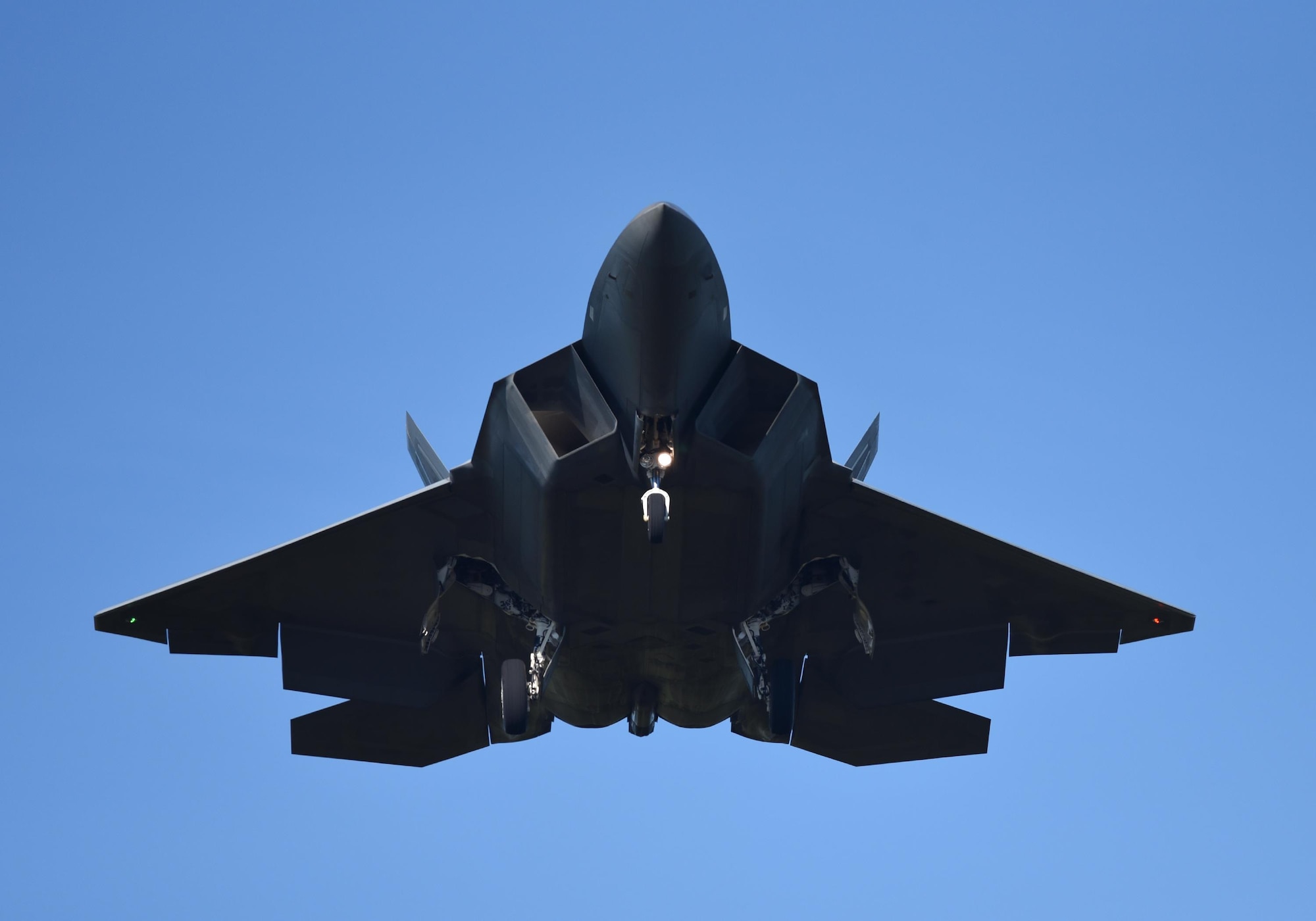 A U.S. Air Force F-22 Raptor prepares to land on the flightline at Tyndall Air Force Base during Checkered Flag 17-1, Dec. 8, 2016. During Checkered Flag 17-1, Tyndall’s F-22s were joined by F-35 Lightning IIs, F-15E Strike Eagles, F-16 Fighting Falcons, HH-60G Pave Hawks and an E-3 Sentry to integrate seamless training combat operations in a simulated deployed location. (U.S. Air Force photo by Staff Sgt. Alex Fox Echols III/Released)