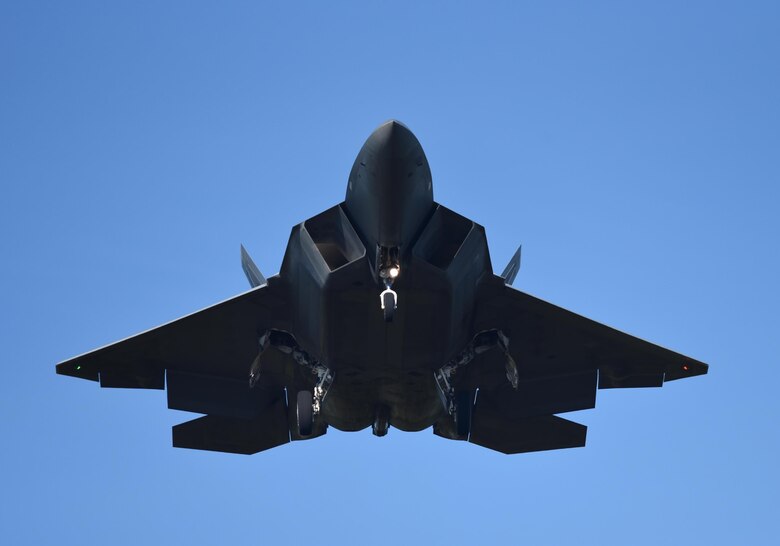 A U.S. Air Force F-22 Raptor prepares to land on the flightline at Tyndall Air Force Base during Checkered Flag 17-1, Dec. 8, 2016. During Checkered Flag 17-1, Tyndall’s F-22s were joined by F-35 Lightning IIs, F-15E Strike Eagles, F-16 Fighting Falcons, HH-60G Pave Hawks and an E-3 Sentry to integrate seamless training combat operations in a simulated deployed location. (U.S. Air Force photo by Staff Sgt. Alex Fox Echols III/Released)