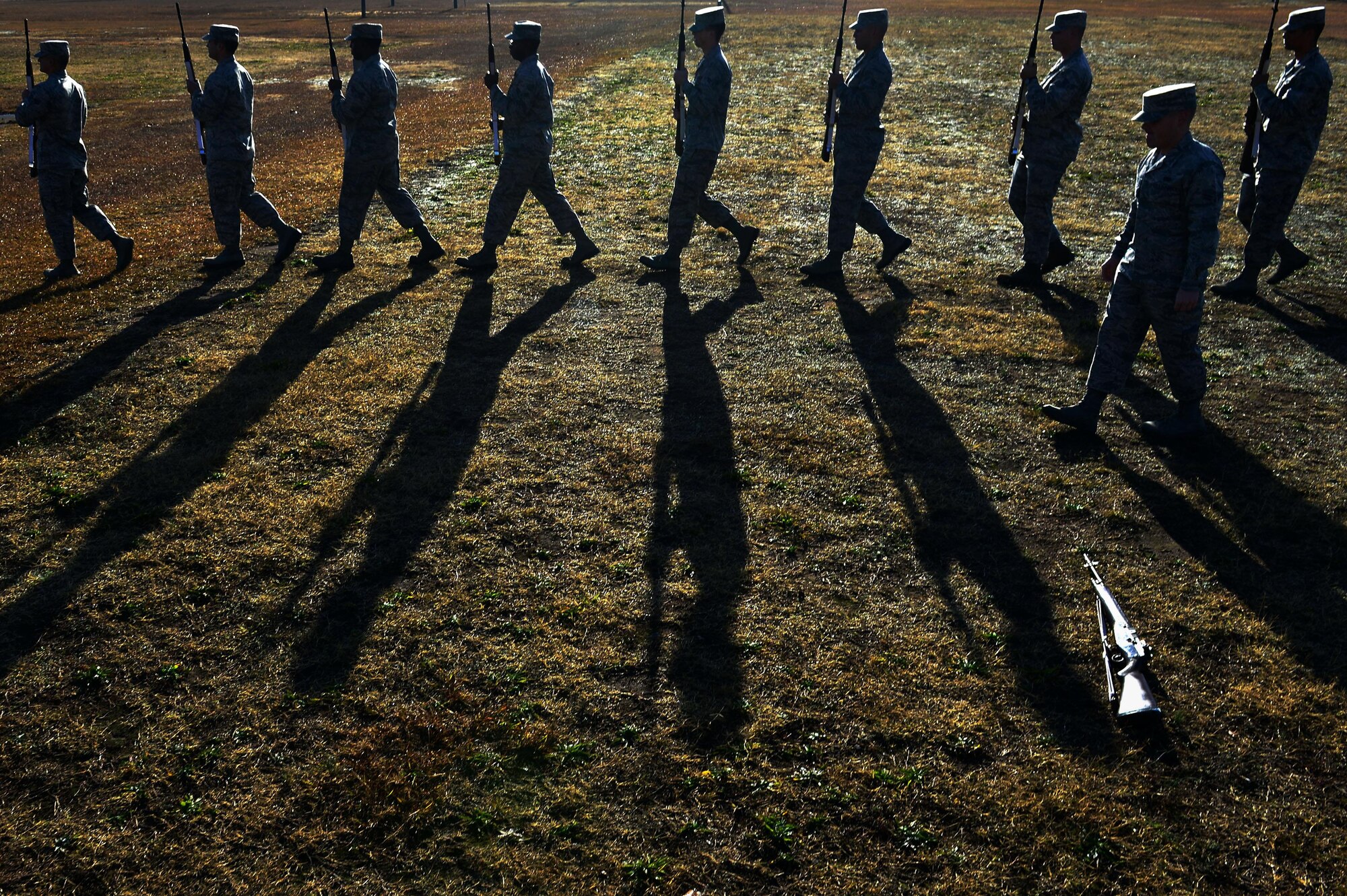 U.S. Airmen assigned to the 20th Force Support Squadron Honor Guard march at Shaw Air Force Base, S.C., Dec. 14, 2016. Working as one cohesive unit, honor guardsmen complete two six-month terms, putting their career on-hold to assist in becoming a ceremonial team. (U.S. Air Force photo by Airman 1st Class Christopher Maldonado)