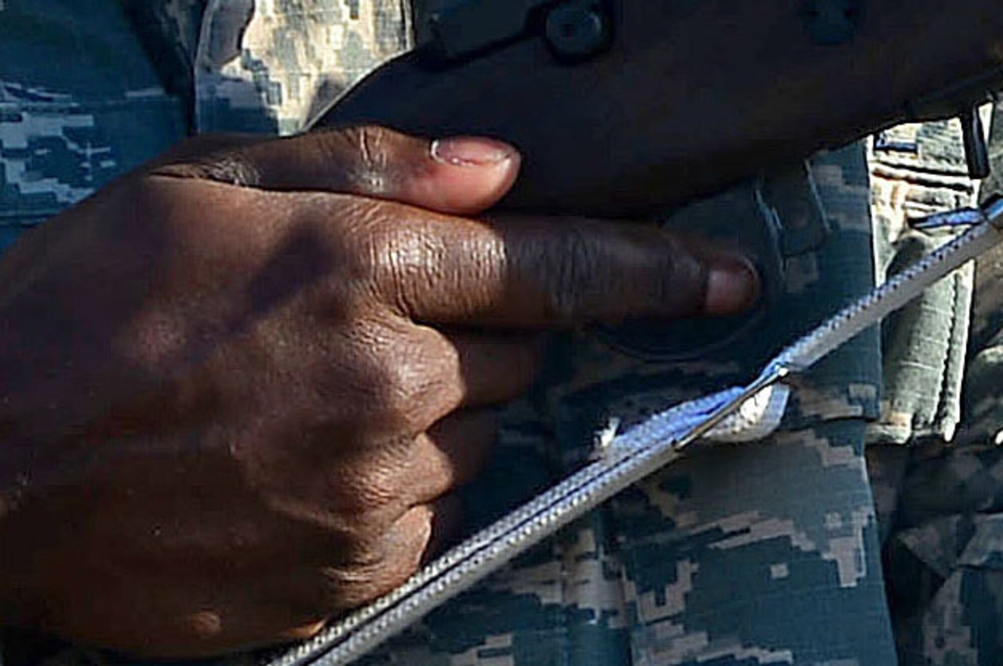 A U.S. Air Force Airman assigned to the 20th Force Support Squadron Honor Guard prepares to fire a ceremonial rifle at Shaw Air Force Base, S.C., Dec. 14, 2016. Honor guardsmen recently assigned or returning for their second term, are given two weeks to learn and refine all ceremonial procedures before performing details locally and across several states. (U.S. Air Force photo by Airman 1st Class Christopher Maldonado)