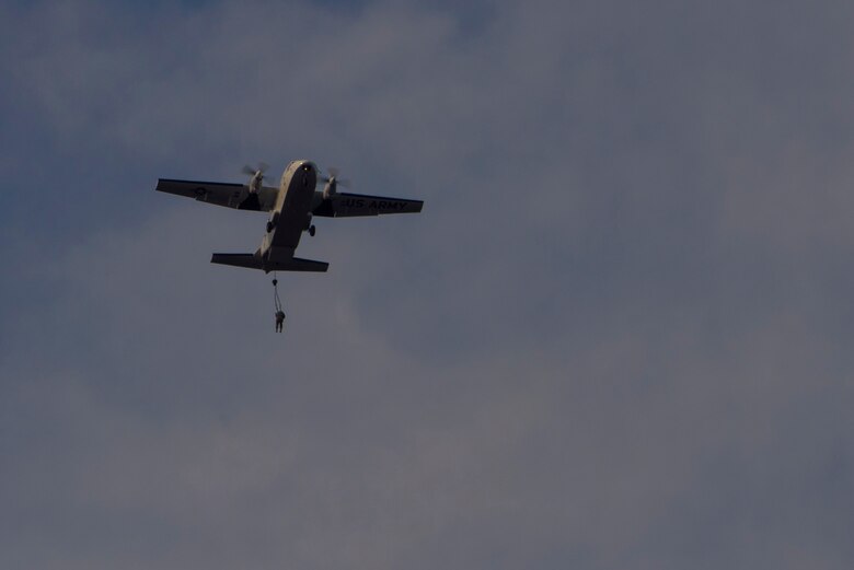 An Airman from the 820th Base Defense Group jumps from a U.S. Army CASA C-212 during the 19th Annual Randy Oler Memorial Operation Toy Drop, Dec. 15, 2016, at Luzon Drop Zone, Camp Mackall, N.C. Not only did the 820th BDG perform in their first Operation Toy Drop, they also completed different airborne standardization and aircraft familiarization trainings to enhance their ability to protect Expeditionary Air Forces. (U.S. Air Force photo by Airman 1st Class Greg Nash)   