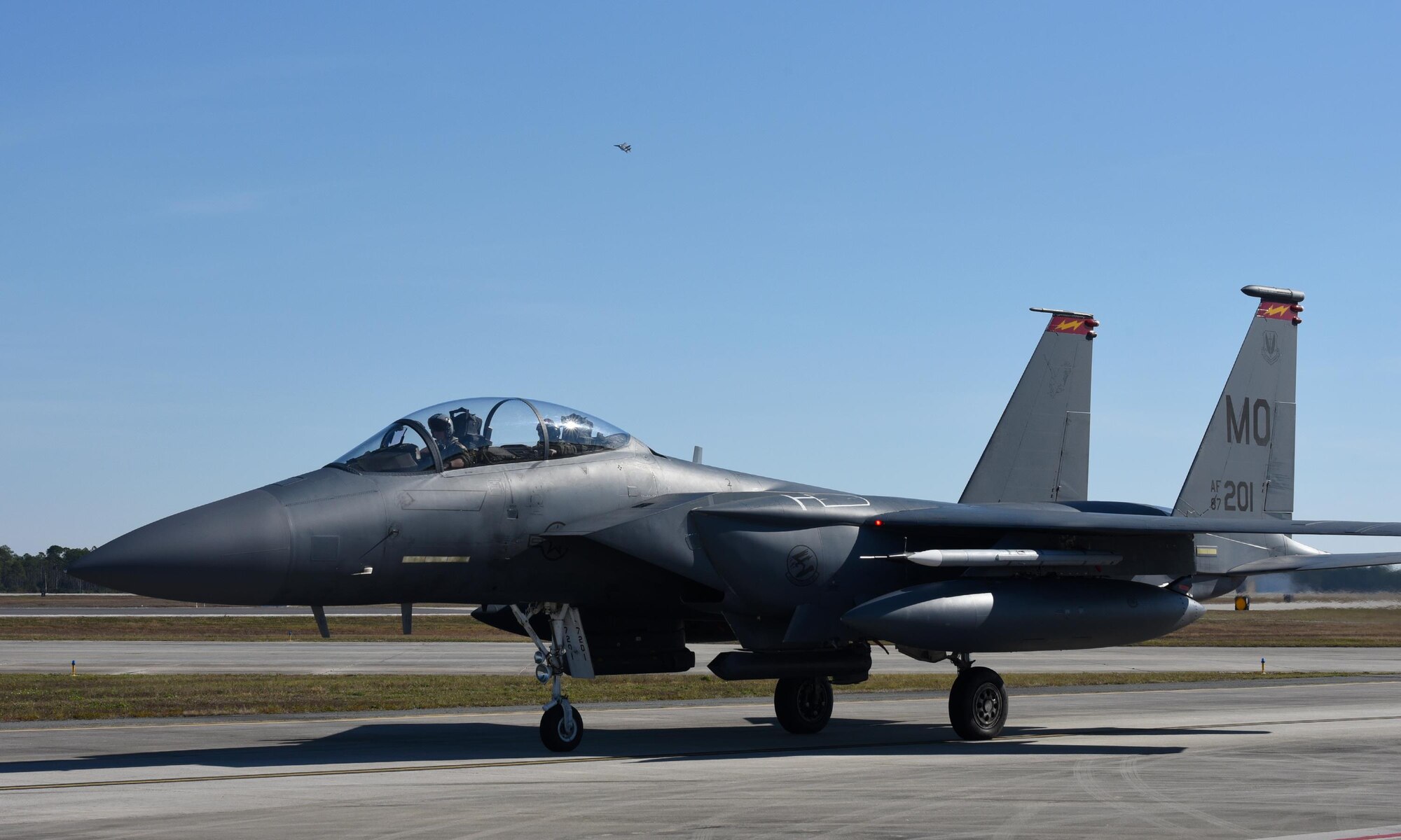 A U.S. Air Force F-15E Strike Eagle from Mountain Home Air Force Base, Idaho, taxies down the flightline during Checkered Flag 17-1 at Tyndall Air Force Base, Fla., Dec. 16, 2016. More than 300 Airmen from Mountain Home AFB deployed along with 16 F-15E Strike Eagles to participate in the large-force exercise, integrating with other fourth-generation aircraft as well as the F-22 Raptor and the F-35 Lightning II. (U.S. Air Force photo by Staff Sergeant Alex Fox Echols III/Released)