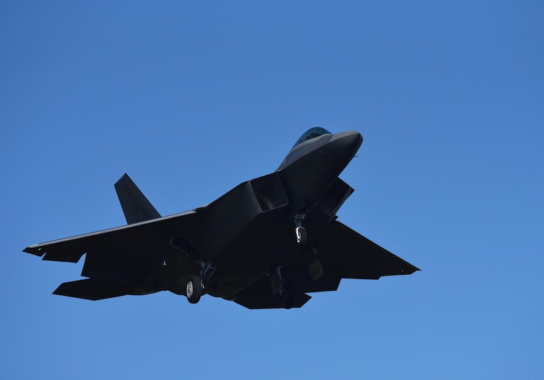 A U.S. Air Force F-22 Raptor prepares to land on the flightline at Tyndall Air Force Base during Checkered Flag 17-1, Dec. 8, 2016. Tyndall’s F-22s were joined by F-35 Lightning IIs, F-15E Strike Eagles, F-16 Fighting Falcons, HH-60G Pave Hawks and an E-3 Sentry, to integrate seamless training combat operations in a simulated deployed location. (U.S. Air Force photo by Staff Sgt. Alex Fox Echols III/Released)