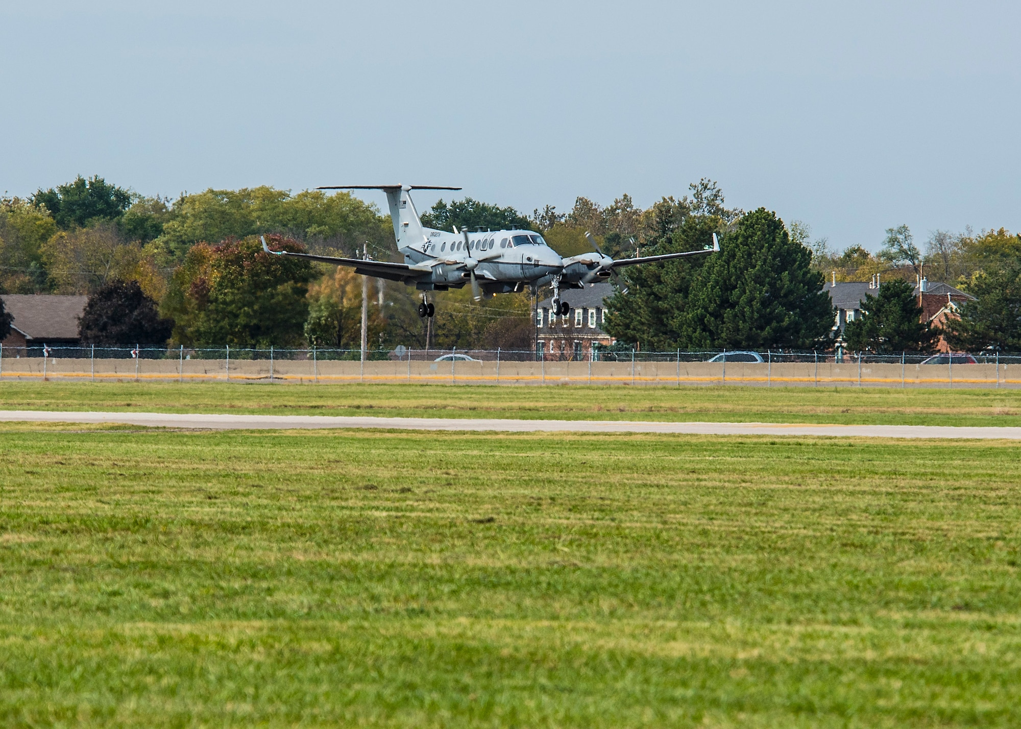 DAYTON, Ohio -- A Hawker-Beechcraft MC-12W Liberty aircraft lands at the National Museum of the U.S. Air Force on October 26, 2016. In U.S. Air Force service from 2009-2016, the unarmed Liberty collected information using a variety of sensors as an Intelligence, Surveillance, and Reconnaissance (ISR) platform.(U.S. Air Force photo by Victoria Thomas)