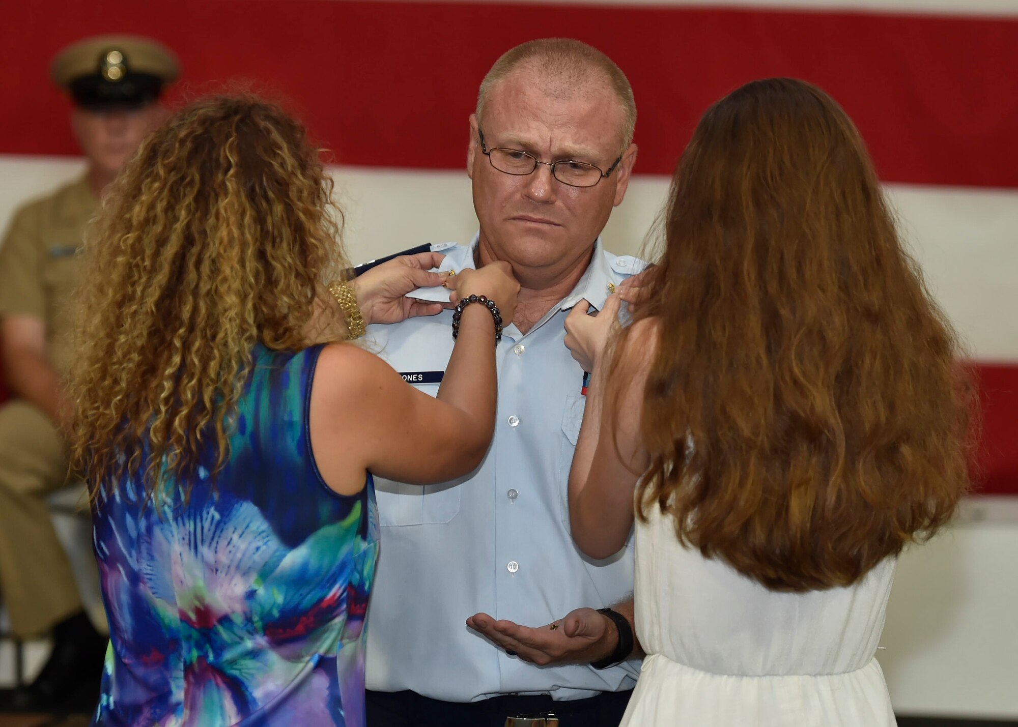 U.S. Air Force Capt. Norman Jones, 628th Air Base Wing chaplain, receives the gold fouled anchor collar insignia of a U.S. Navy chief petty officer Sept. 16, 2016, at Joint Base Charleston - Naval Weapons Station, South Carolina. Jones was pinned as an honorary CPO for his prior service in the Navy as well as his time as Naval Nuclear Power Training Command chaplain. 