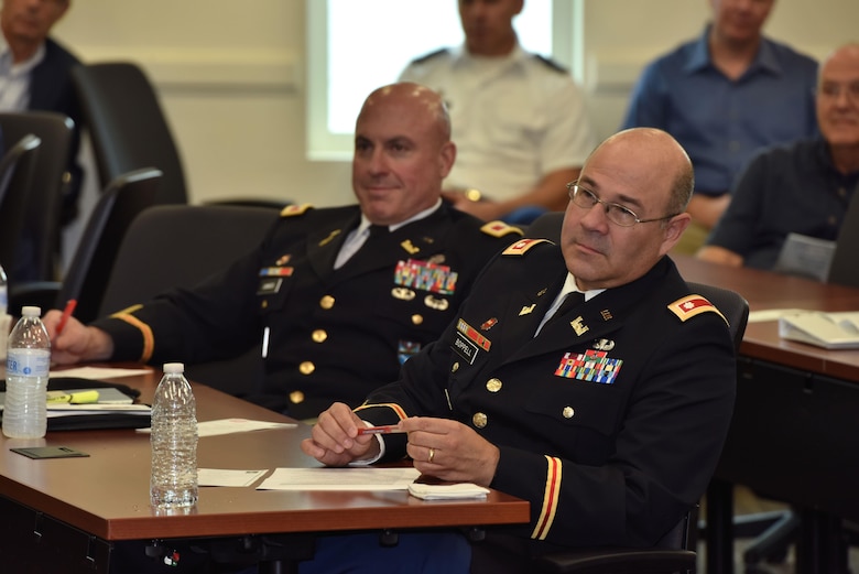 United States Army Corps of Engineers Mobile District Deputy Commander for Latin America, Lt. Col. Humberto Boppell, listens as Col. James DeLapp, Mobile District commander honors him during a retirement ceremony Dec. 16 at the Conference Center of America’s in Miami, Fla. Boppell retired after 27 years of distinguished service to the nation. (Photo by Tim Oberle, USACE Mobile Public Affairs) 