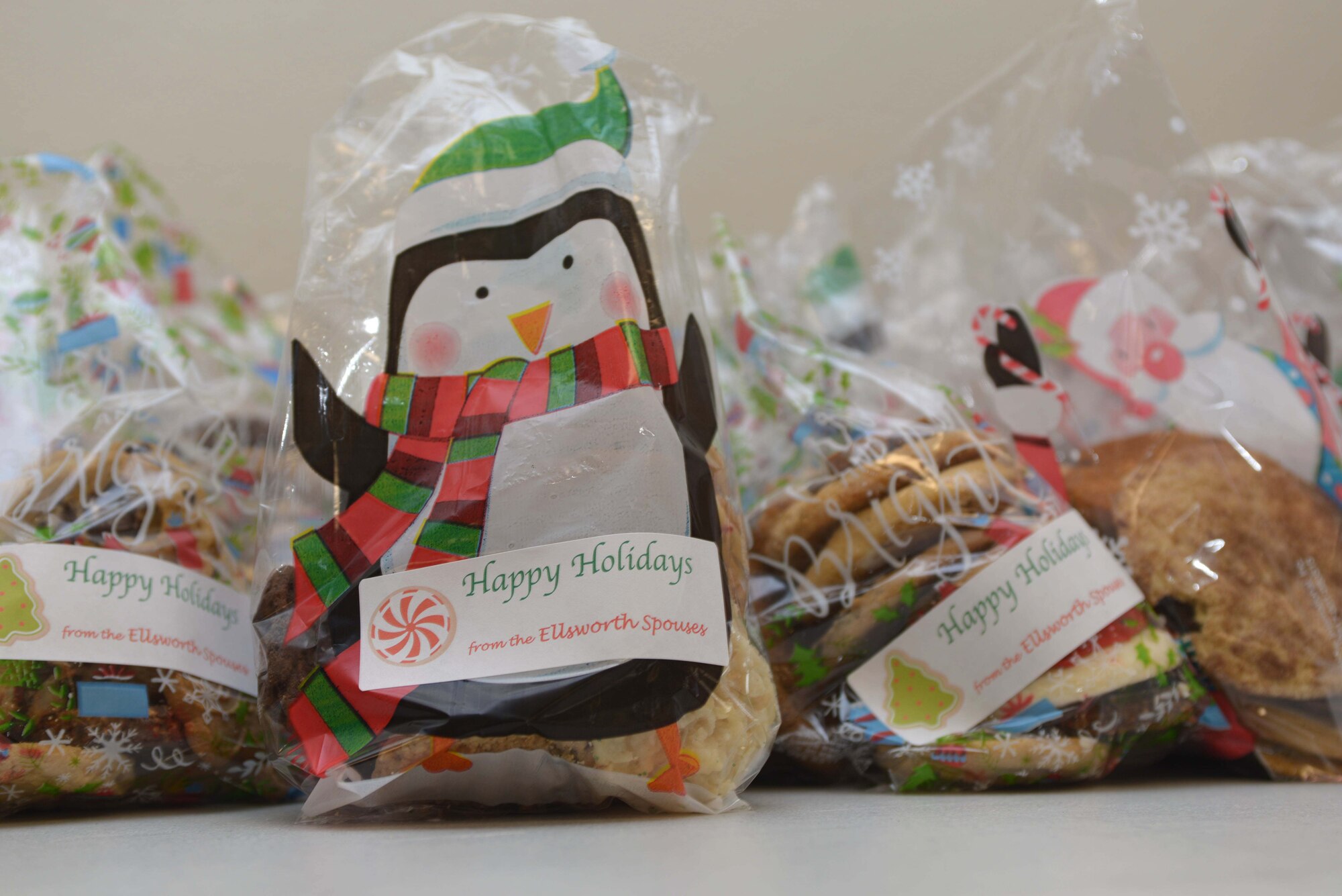 Cookies are collected and bagged for Airmen assigned to Ellsworth Air Force Base during the 5th annual Holiday Cookie Drive hosted by Enlisted Spouses' Club and the Officer and Civilian Spouses' Club at the Box Elder Event Center, S.D., Dec. 14, 2016. Once bagged, the spouses deliver the cookies door to door to Ellsworth Airmen residing in the dorms. (U.S. Air Force photo by Airman 1st Class Donald C. Knechtel)
