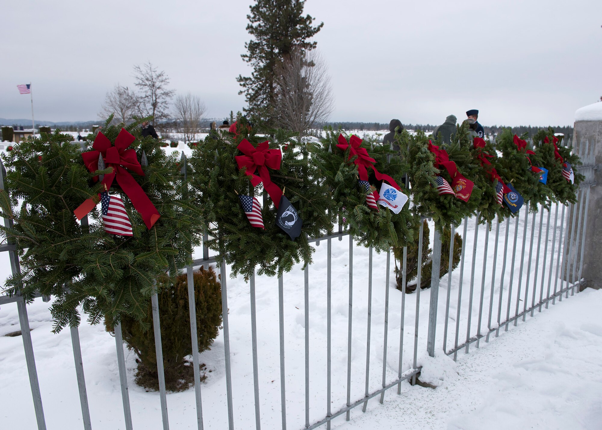 Ceremonial wreaths dedicated to the five military services decorate the perimeter of the Fort George Wright Cemetery Dec. 19, 2016, near Spokane, Wash. The wreaths were part of a ceremony to honor the memory of service members buried at the site. (U.S. Air Force photo/Airman 1st Class Ryan Lackey)