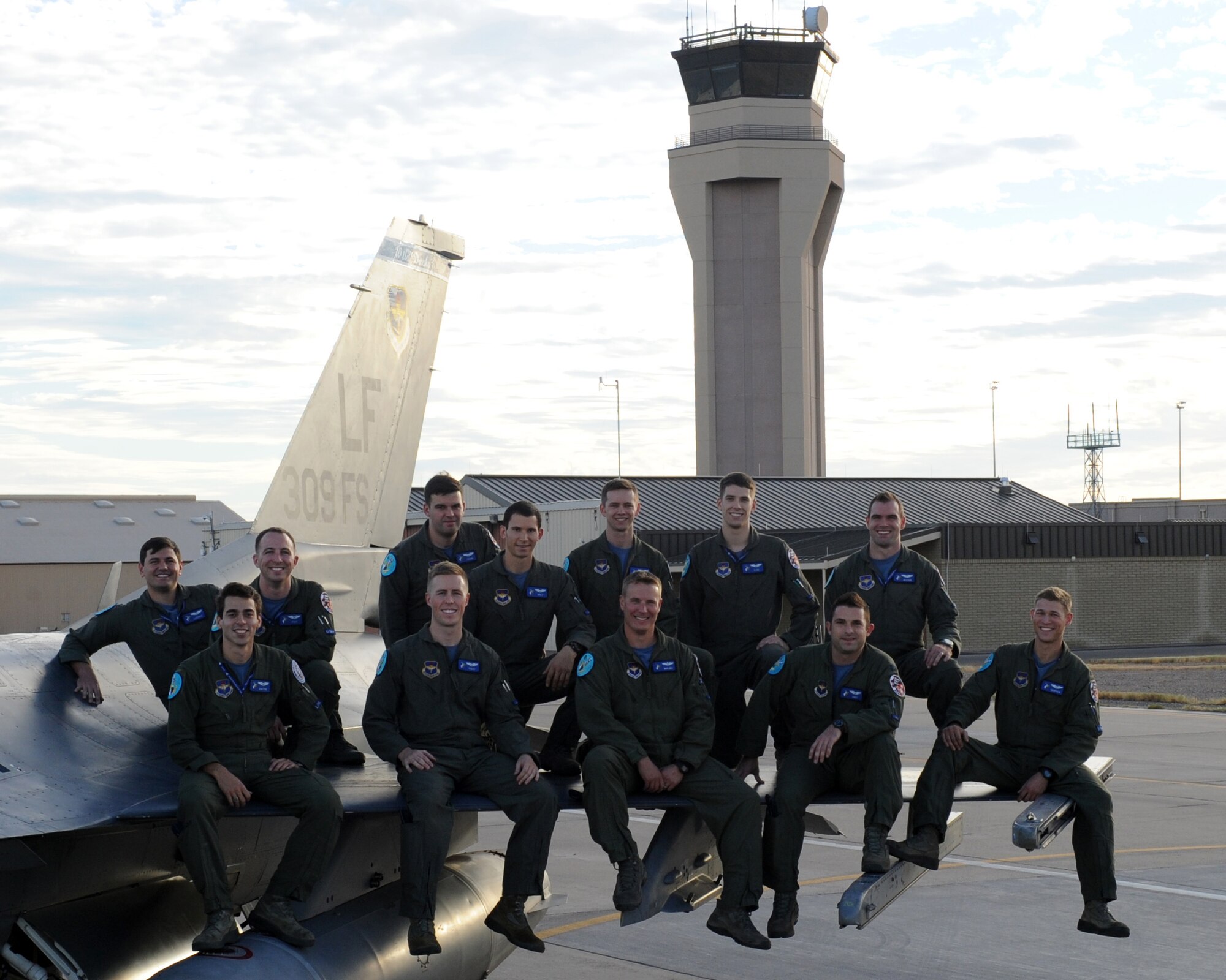 The 309th Fighter Squadron graduated 12 F-16 Fighting Falcon pilots to the combat Air Force. FRONT ROW: 1st Lt. Tim Joubert, Capt. James French, Maj. David Sproehnle, Capt. Joseph Atherton and 1st Lt. Taylor Absher. BACK ROW: 1st Lts. Kaleb Jenkins, Spencer Peot and Kevin Dugan, Capt. Casey Habluetzel, 1st Lt. J.B. Scott, Capt. Dan Lacroix and 1st Lt. Mitch McKenzie. (Courtesy photo)