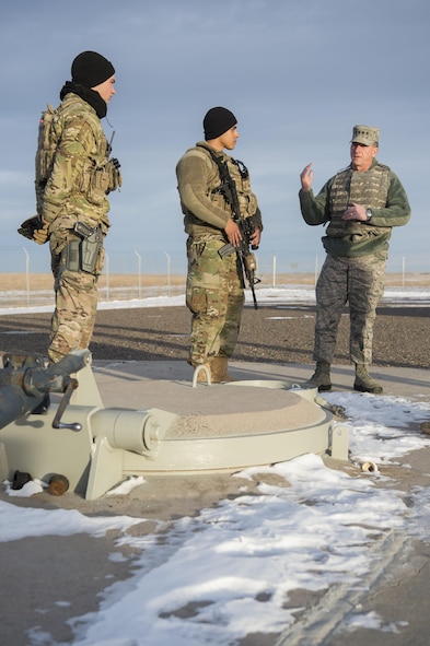 Air Force Chief of Staff Gen. David L. Goldfein discusses the fire team’s ability to provide security to an ICBM launch facility with Airmen from the 90th Missile Security Forces Squadron during a familiarization tour in the 90th Missile Wing missile complex Dec. 19, 2016. The LF portion of his tour provided insight into how the fire team operates and how maintainers get into the missile silo to perform maintenance. (U.S. Air Force photo/Staff Sgt. Christopher Ruano)