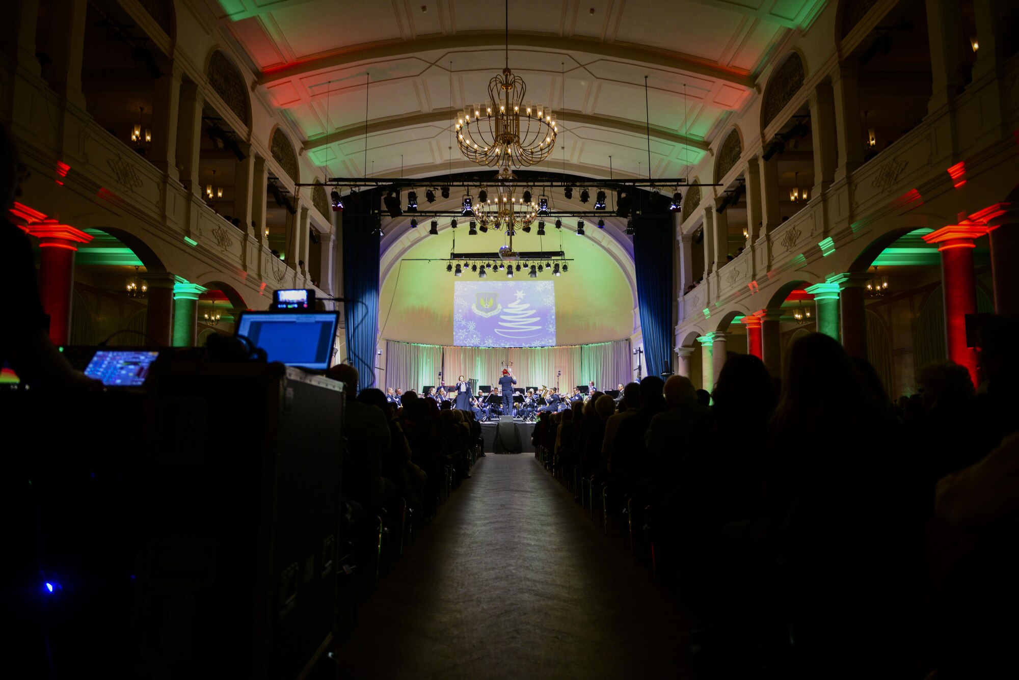 Local nationals and Department of Defense members attend a Christmas concert performed by the U.S. Air Forces Europe band at Kaiserslautern, Germany, Dec. 16, 2016. The performance featured popular American holiday songs and traditional German carols. (U.S. Air Force photo by Airman 1st Class Joshua Magbanua)