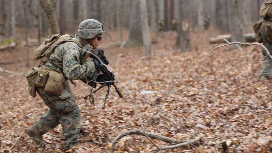Lance Cpl. Quinn R. Knauer runs to his next objective during a deployment for training exercise at Fort Pickett, Va., Dec. 4, 2016. The range was designed for Marines to prepare for their upcoming deployment to Okinawa, Japan. Knauer is a rifleman with 3rd Battalion, 8th Marine Regiment, 2nd Marine Division. 
