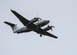 DAYTON, Ohio -- A Hawker-Beechcraft MC-12W Liberty aircraft flies overhead at the National Museum of the U.S. Air Force on October 26, 2016. In U.S. Air Force service from 2009-2016, the unarmed Liberty collected information using a variety of sensors as an Intelligence, Surveillance, and Reconnaissance (ISR) platform.(U.S. Air Force photo by Victoria Thomas)
