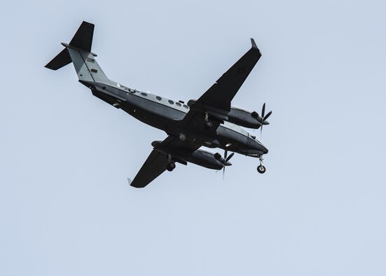 DAYTON, Ohio -- A Hawker-Beechcraft MC-12W Liberty aircraft flies overhead at the National Museum of the U.S. Air Force on October 26, 2016. In U.S. Air Force service from 2009-2016, the unarmed Liberty collected information using a variety of sensors as an Intelligence, Surveillance, and Reconnaissance (ISR) platform.(U.S. Air Force photo by Victoria Thomas)