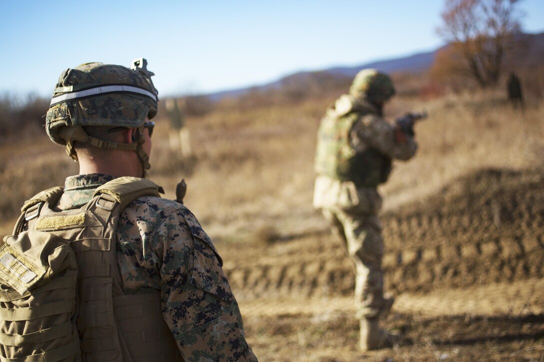 A Marine conducts rifle training with a Ukrainian soldier during Platinum Lion, a training exercise, at Novo Selo Training Area, Bulgaria, Dec. 15, 2016.  Marine Corps photo by Lance Cpl. Timothy J. Lutz