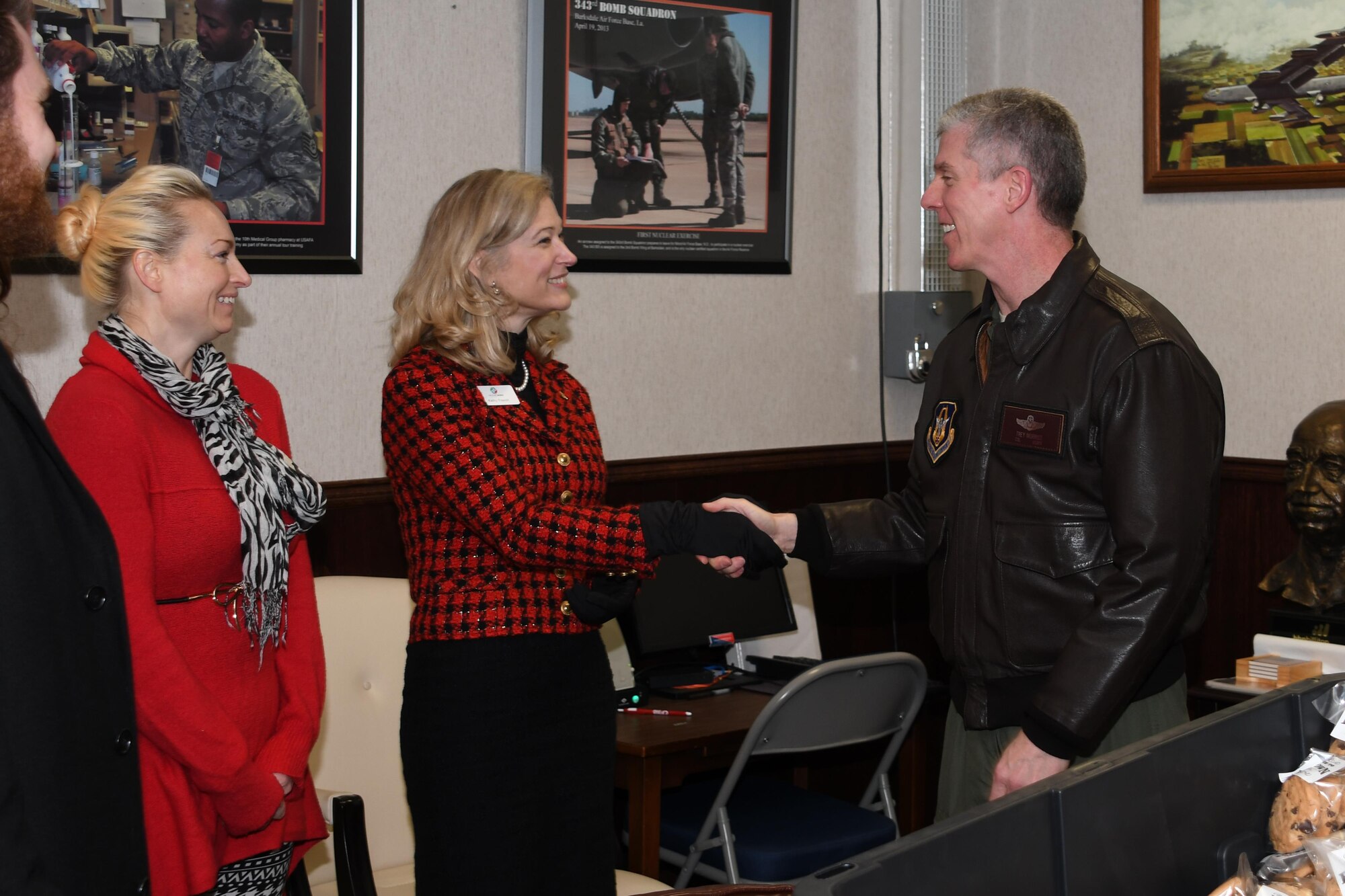 U.S. Air Force Col. James L. Morriss III, 307th Bomb Wing vice-commander, welcomes Bossier City Chamber of Commerce Military Relations Committee members to the 307th BW Headquarters Dec. 20, 2016 at Barksdale Air Force Base, La.  The committee, along with staff from Boomtown Casino, delivered more than 1200 cookies to the 307th BW as a special holiday display of appreciation. (U.S. Air Force photo by Tech. Sgt. Ted Daigle/released)