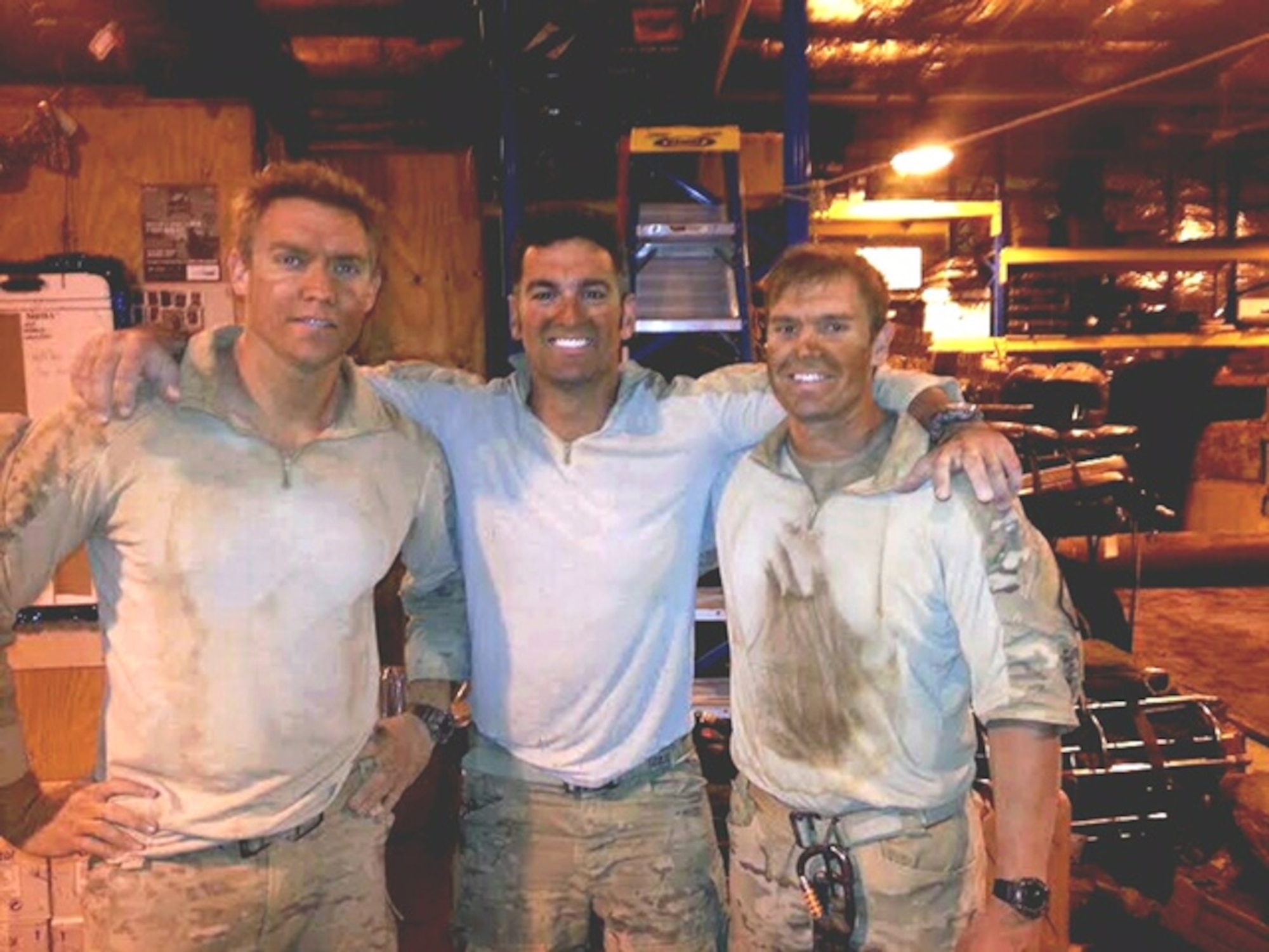 Three 920th Rescue Wing pararescuemen were part of the most challenging mission of 2013 which led to them being awarded the Mackay Trophy. (From left to right) Staff Sgt. Lee Von Hack-Prestinary, Tech. Sgt. Dan Warren and Tech. Sgt. Jason Broline earned the award for their heroic efforts to safely evacuate American citizens and provide medical care to the passengers who were critically injured when their CV-22 Osprey came under heavy enemy fire during the mission December 21, 2013. (Courtesy photo)