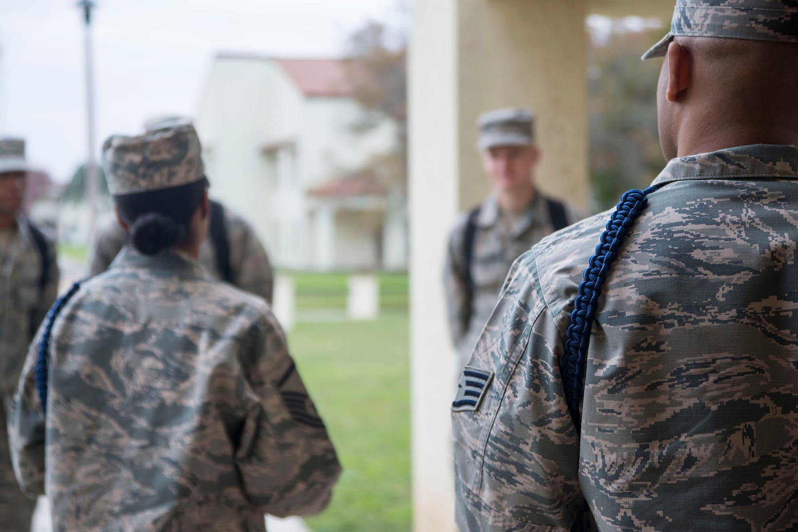 Master Sgt. Kelli Jackson (left), 558th Flying Training Squadron military training leader and superintendent, and Derius Jackson, 558th FTS military training leader and assistant flight chief, conduct morning formation with basic sensor operator technical training students at Joint Base San Antonio-Randolph Dec. 14, 2016. To become an MTL, a special duty, service members must be recommended by their leadership and graduate from a Military Training Leader Course at Keesler Air Force Base, Miss. (U.S. Air Force photo by Airman 1st Class Lauren Parsons/Released)