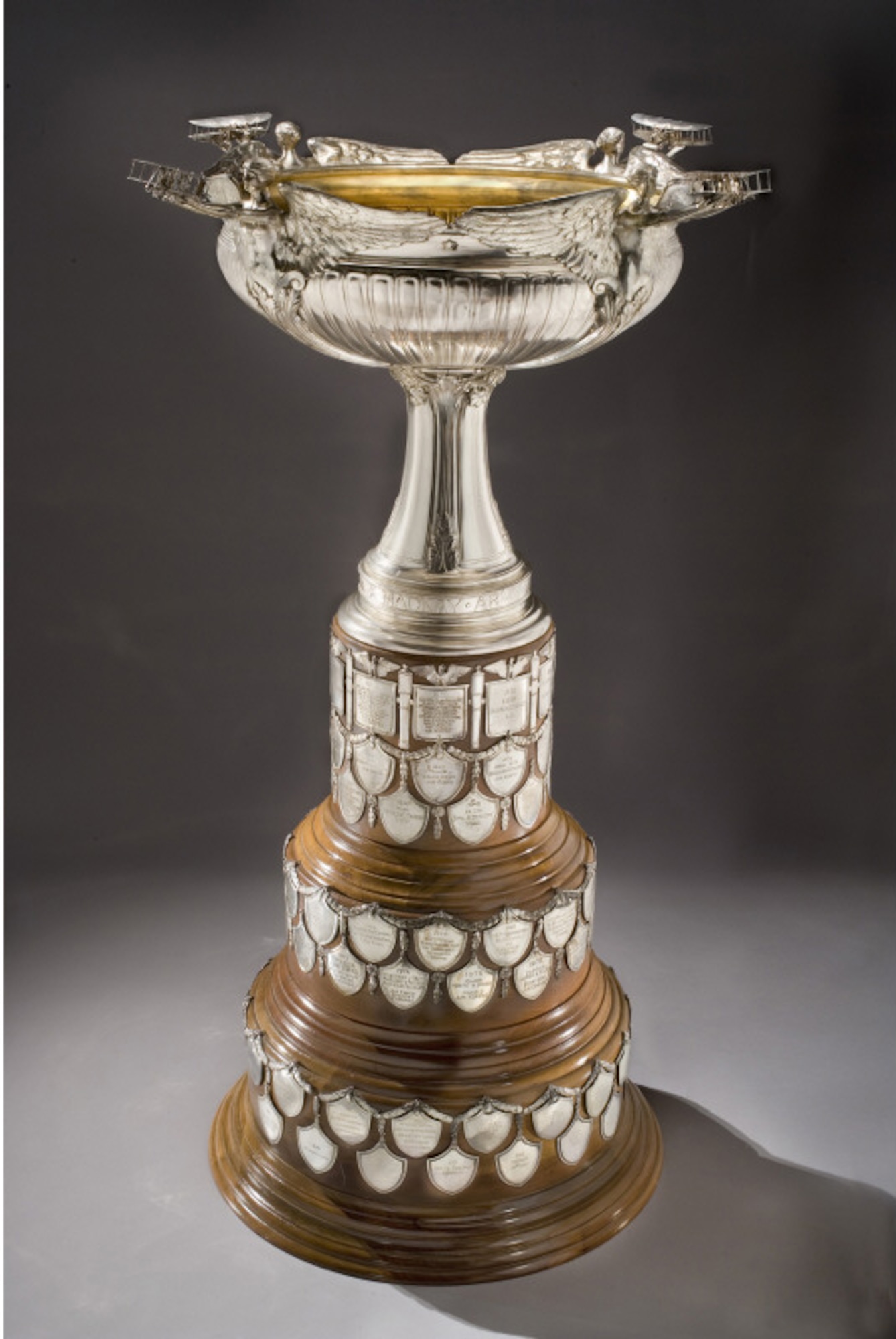 The Mackay Trophy, manufactured by renowned American jeweler and design house Tiffany and Co. in 1911, stands 42” high and consists of a massive silver cup, lined in gold, with four winged angels holding Wright military flyers, atop a three-tiered mahogany base. The base is adorned with silver medallions engraved with the names of legendary U.S. Air Force Airmen and organizations. (Courtesy photo)
