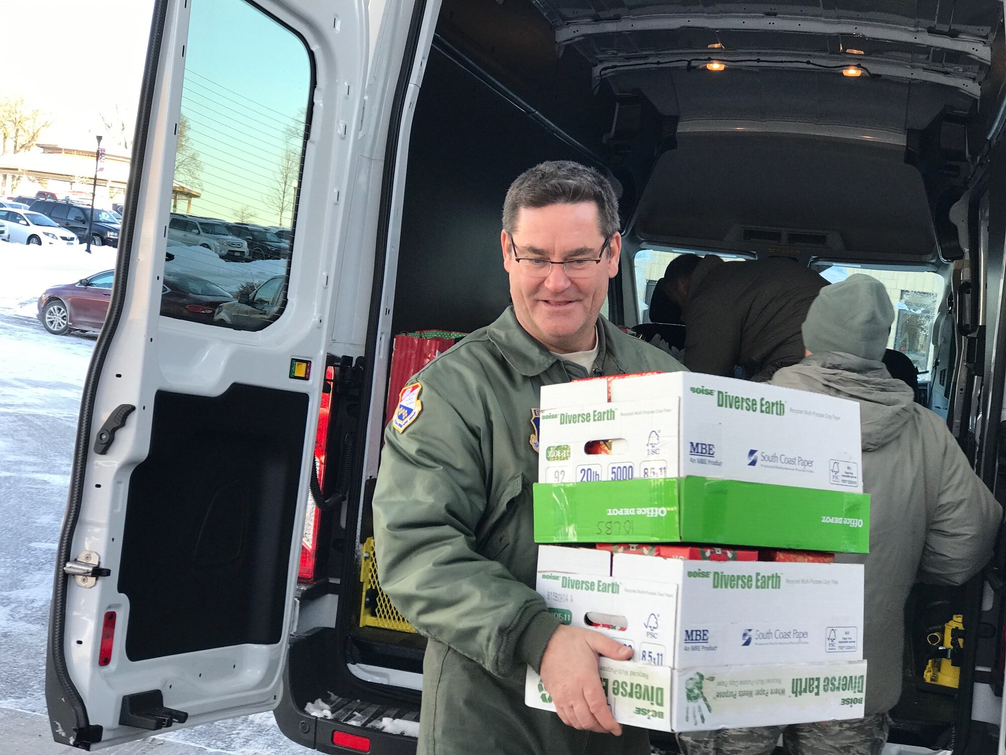 Master Sgt. James Courneya, 934th Operations Group, unloads gifts at the Minnesota Veteran's Home Dec. 15.